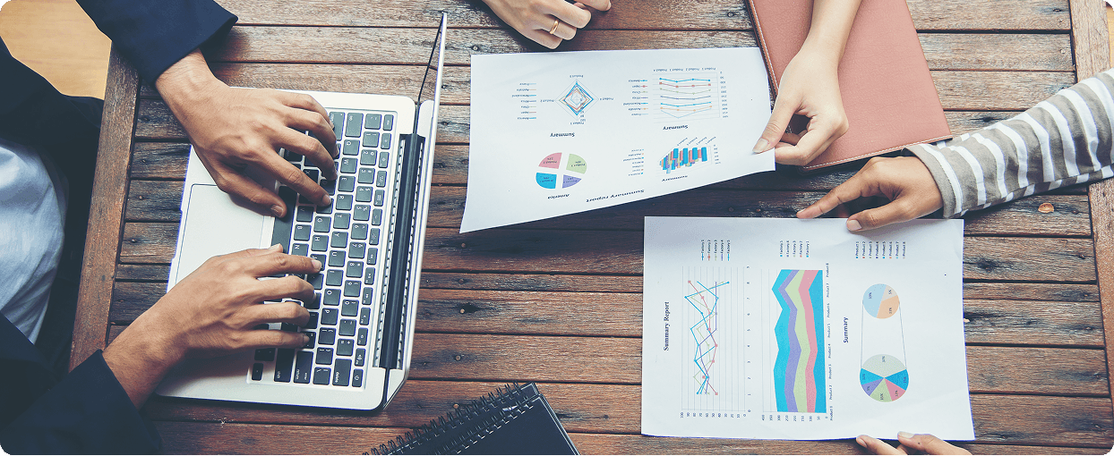 Team working with data reports